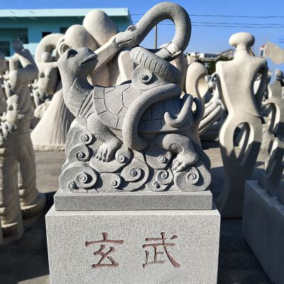 公園里擺放的回頭的砂石石雕創意玄武雕塑